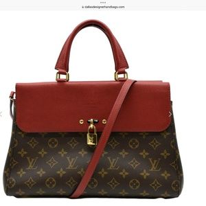 Louis Vuitton with their signature print with red flaps and red lining interior